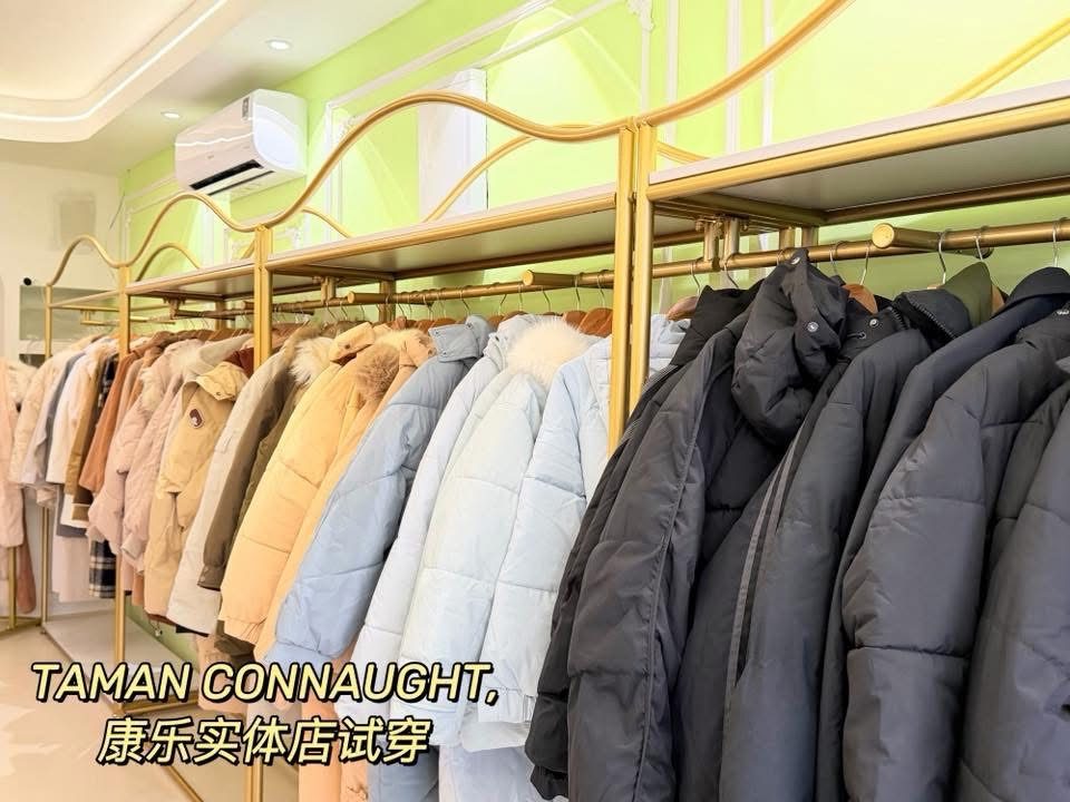 Rack of winter jackets available for rent at the Cheras fitting store 冬装出租店内的外套架